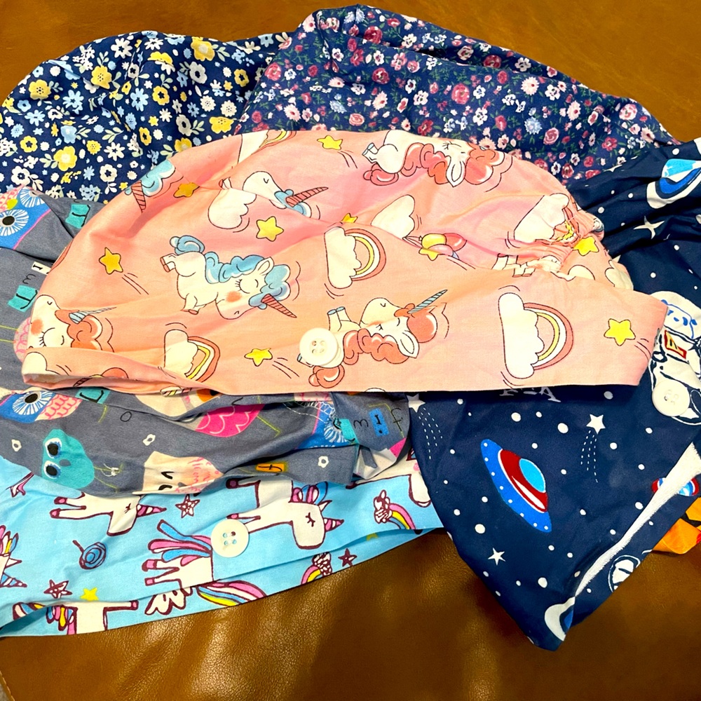 7 scrub caps with buttons sold as set